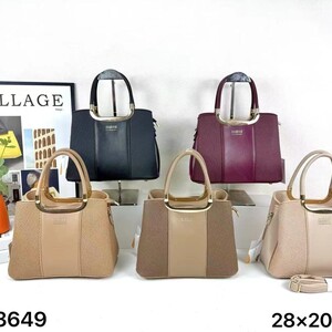 شنطة يد أنيقة بلمسات فخمة